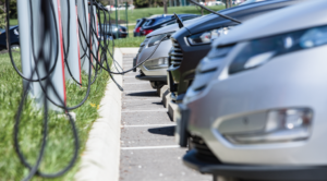 Electric vehicles parked at charging stations
