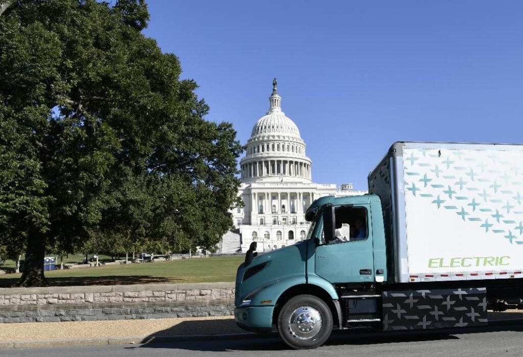 An electric truck in front of the Capitol Building in Washington, D.C.